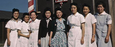 Group of Asian Women Standing smiling at the camera