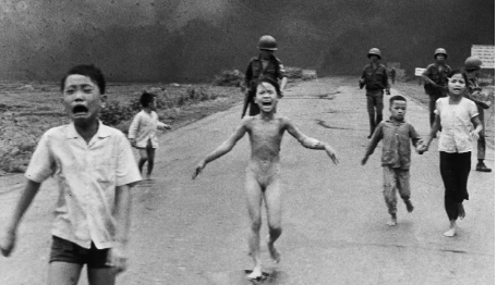 June 8, 1972: Kim Phúc, center left, running down a road naked near Trảng Bàng after a South Vietnam Air Force napalm attack (Source: Wikimedia Commons)