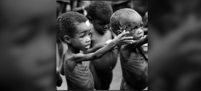 Exploitational image of starving children reaching toward camera