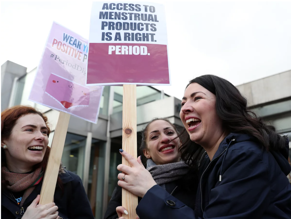 Scottish Parliament member Monica Lennon (right) joins supporters of the Period Products bill she sponsored, at a rally outside Parliament in Edinburgh on Tuesday.