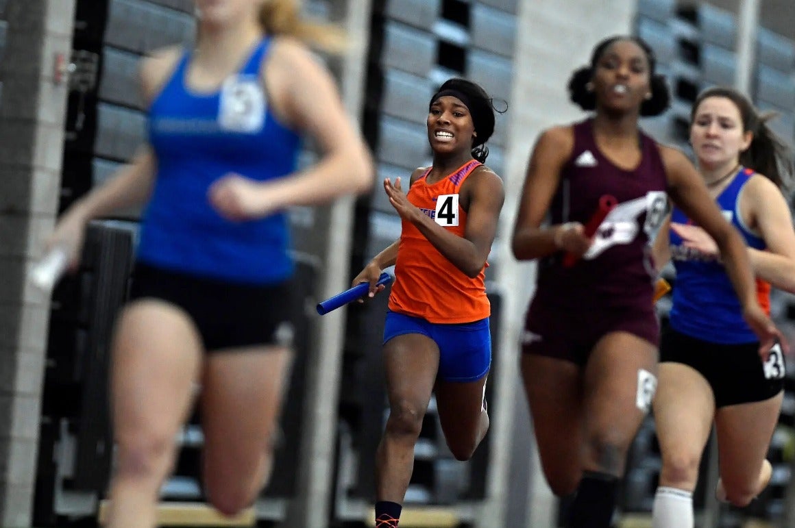 Terry Miller running in a track meet