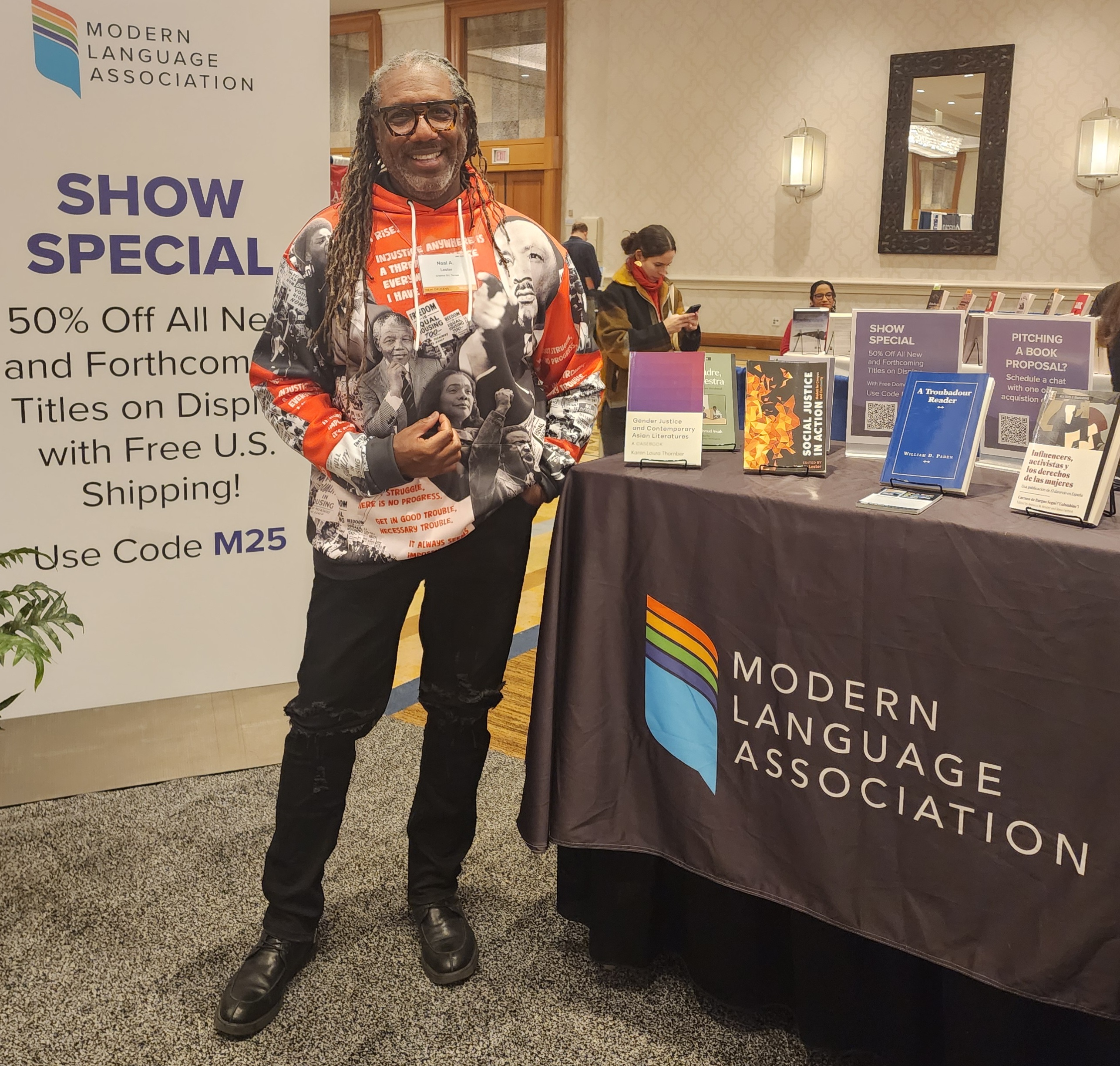 Dr. Lester with book at MLA2025