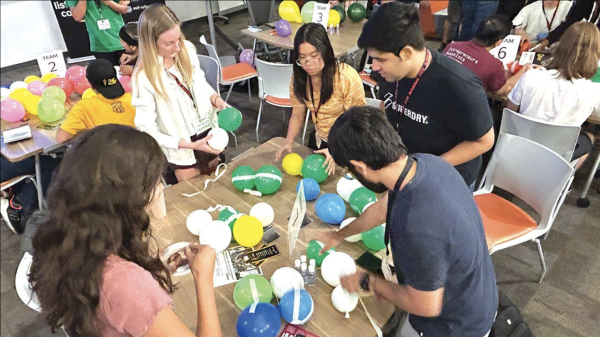 Ahwatukee prof’s group ‘hacks’ for social good